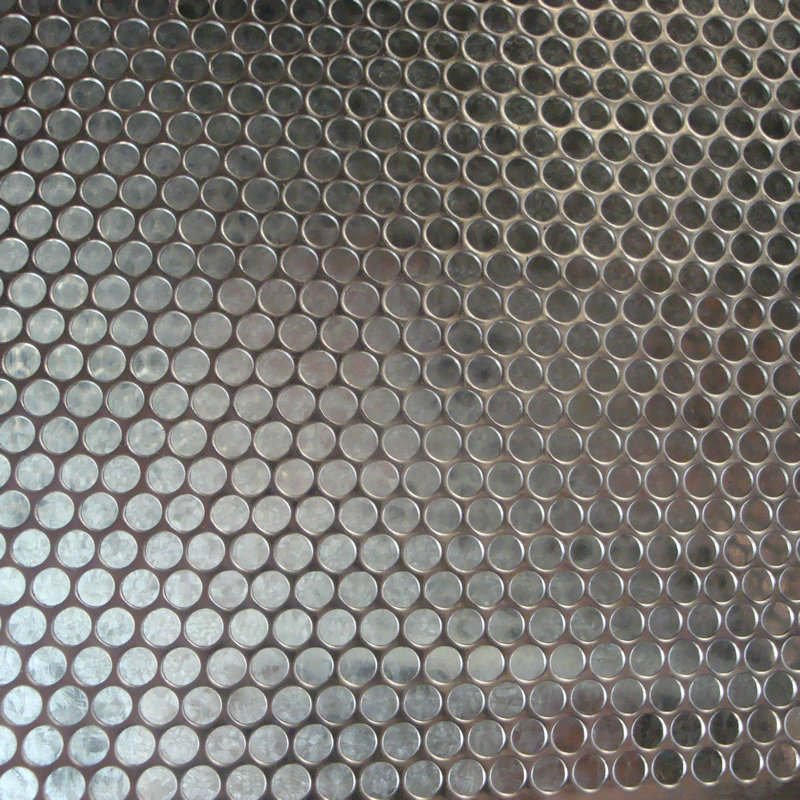 微孔冲孔网冲床的改进